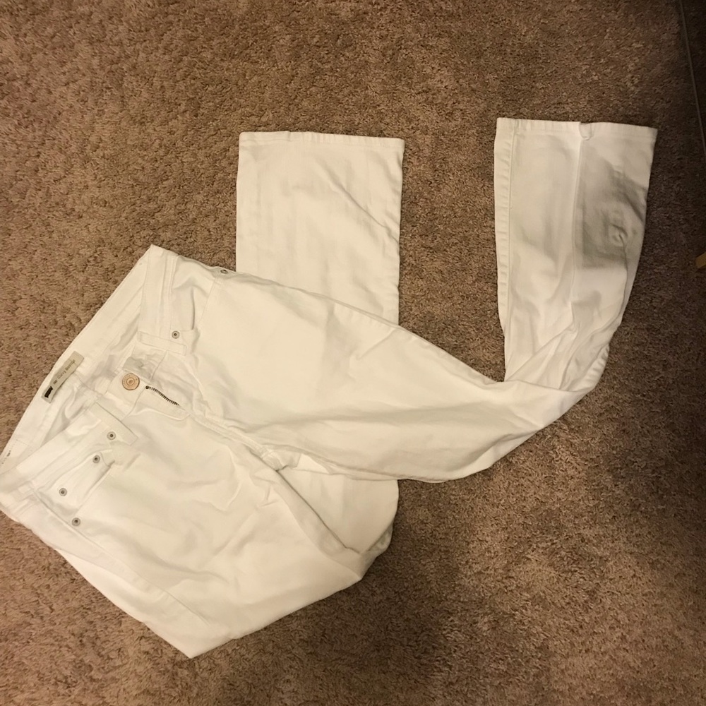 White bootcut jeans.